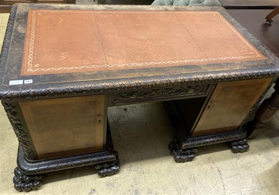 An early 20th century Continental oak kneehole desk, width 160cm, depth 84cm, height 79cm